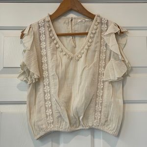 Cream TULAROSA blouse with Pom Pom details
